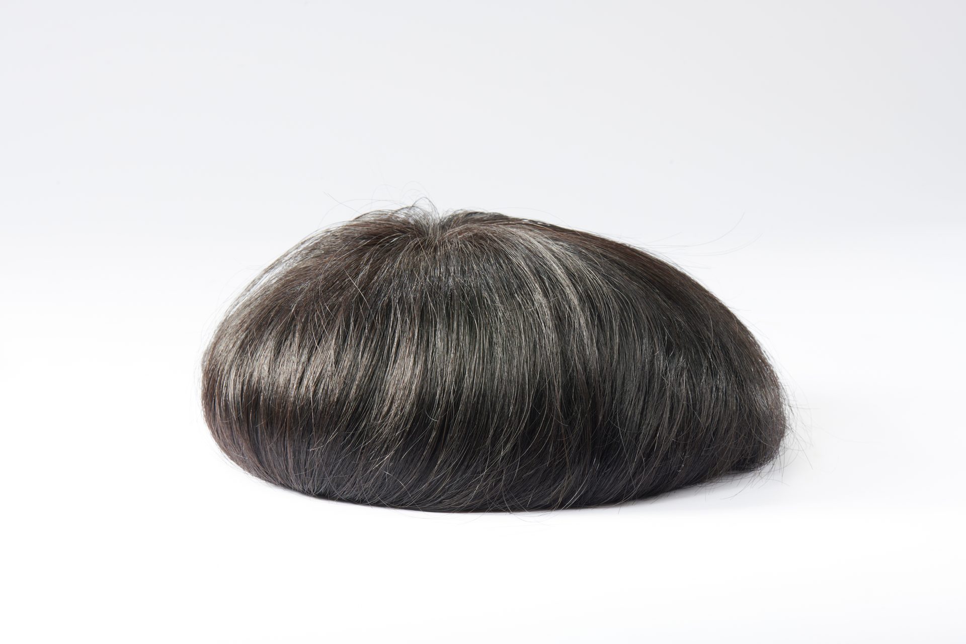 Finished bespoke hair system — plate 01